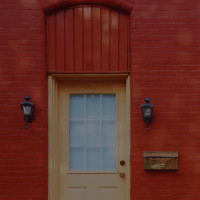 Hero image with brick wall and door